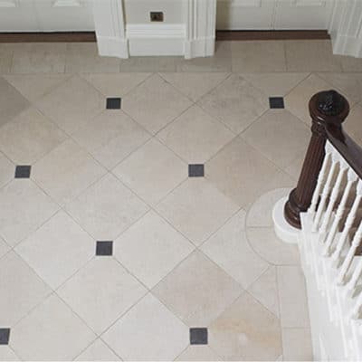 FONTAINE TUMBLED FLOOR WITH BORDER AND BELGIAN BLUE CABOCHANS