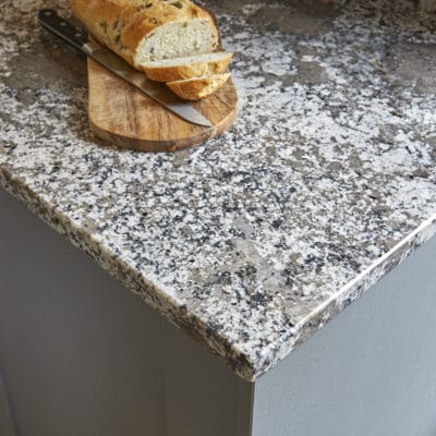 granite worktop with bread board and loaf