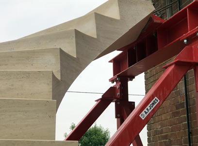 a post-tensioned staircase made for natural stone interiors