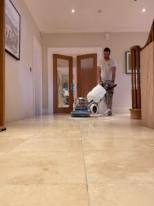 A specialist stone care company cleaning a natural stone floor